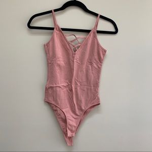 Pink bodysuit